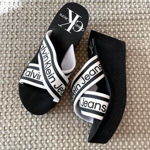 Calvin Klein Women’s Resort Wedge Slide